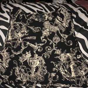 Patterned black crop top with open back